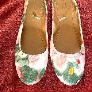 Pair of white and floral flats size 9